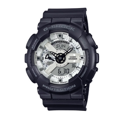 A black CASIO G-SHOCK analog-digital watch with a resin band and a digital display showing time, date, and various watch features.