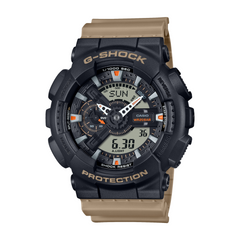 A Casio G-Shock GA-110TU-1A5DR watch with a black case, digital display, and tan resin band.