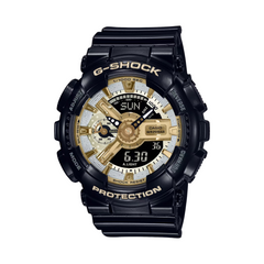 A Casio G-Shock watch with a black band and casing, featuring a black dial with gold accents, analog and digital displays, and the G-Shock logo.