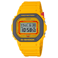 A yellow CASIO G-SHOCK digital watch with a resin band and buckle clasp, displaying time and various watch features on its digital screen.