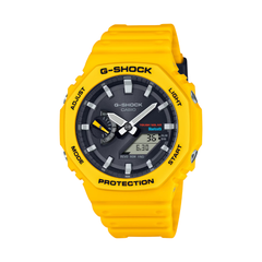 Yellow G-Shock watch on a white background