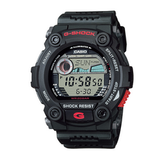 A black CASIO G-SHOCK digital watch with a digital display, showing features such as world time, stopwatch, and alarm.