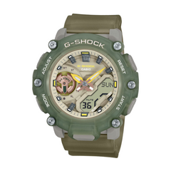 A Casio G-Shock watch with a green band and casing, featuring an analog-digital display in beige and green colors.