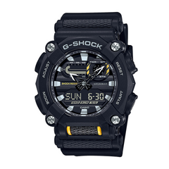 A black CASIO G-SHOCK watch with an analog-digital display, buttons, and a resin band.