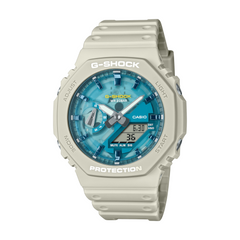 G-Shock watch with beige strap and blue face on a white background
