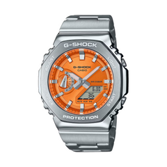 A CASIO G-SHOCK watch with a silver band and case, featuring an orange dial and digital display.