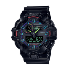 A black CASIO G-SHOCK watch with a digital display, featuring blue and red accents on the watch face and a resin band.