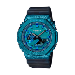A Casio G-Shock watch with a blue ion plated bezel, digital display, and a black resin band.