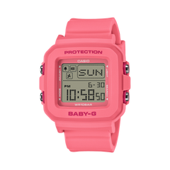 Pink Casio digital watch on a white background