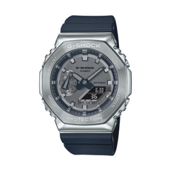 A CASIO G-SHOCK GM-2100-1ADR watch with a silver resin band and stainless steel case, featuring a digital display and analog hands.