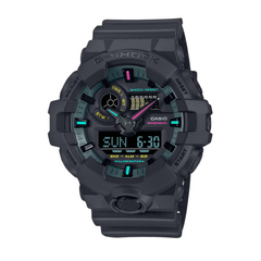 A black CASIO G-SHOCK analog-digital watch with a resin band and digital display showing time and various watch features.
