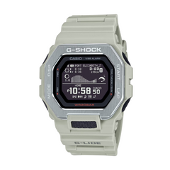 A CASIO G-SHOCK watch with a gray band and case, featuring a digital display showing time, date, and various smart watch features.