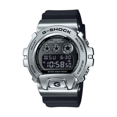 A digital CASIO G-SHOCK watch with a black band and silver-colored case, displaying a digital screen.