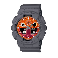 A Casio G-Shock GA-100FL-8A watch with a gray band and case, featuring an orange and white dial, digital and analog display, and various watch features displayed.