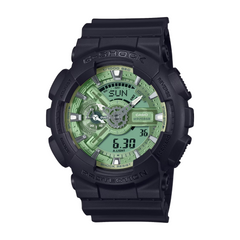A black CASIO G-SHOCK analog-digital watch with a green dial and black band.