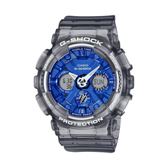 A CASIO G-SHOCK watch with a blue analog dial and gray resin band, showing features such as world time, stopwatch, and alarm.