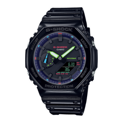 A black CASIO G-SHOCK watch with a digital display, featuring a blue and red accent on the dial and a resin band.
