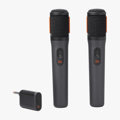 Two JBL PartyBox wireless microphones with a USB-C charging cable and a dongle.