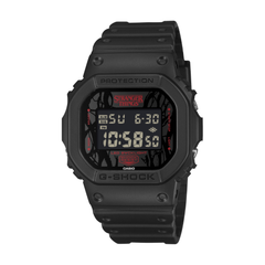 Black Casio G-Shock watch with digital display on a white background