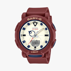 A Casio Baby-G analog-digital watch with a red band and casing, featuring a white dial, blue accents, and a digital display.