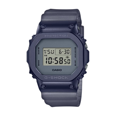 A digital CASIO G-SHOCK watch with a blue ion plated bezel, digital display showing time and date, and a gray resin band.