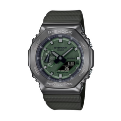 A black CASIO G-SHOCK watch with a digital display and resin band, showing a green dial and the G-SHOCK logo.