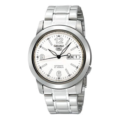 A silver Seiko analog watch with a white dial and stainless steel band.