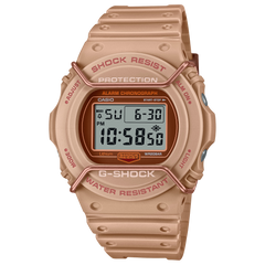 A Casio G-Shock digital watch in a pink color with a resin band and case, featuring a digital display, alarm, and stopwatch functionalities.