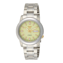 A silver Seiko watch with a green dial and a stainless steel bracelet.