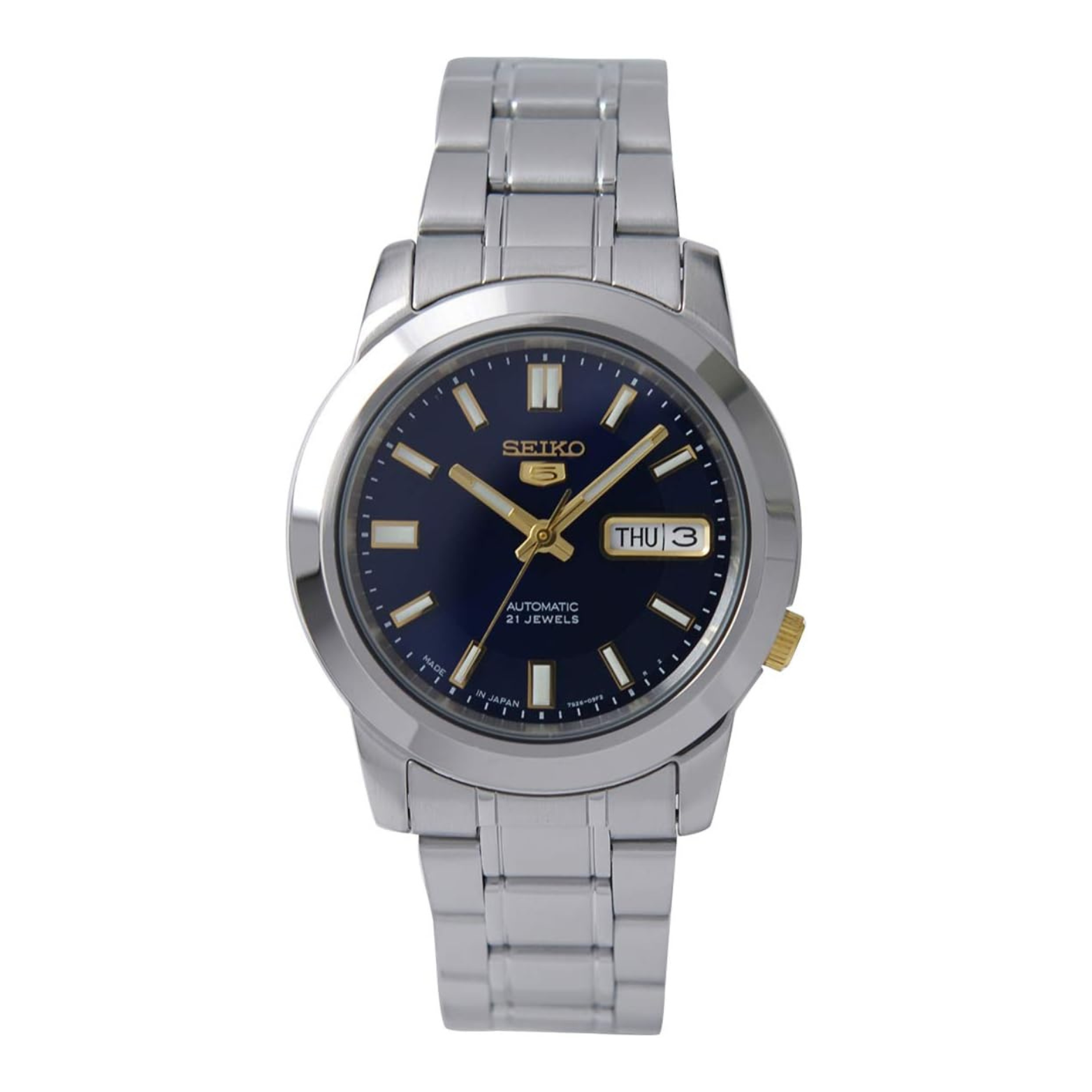 A Seiko SNKK11J1 men's watch with a blue dial, luminous hands and markers, a stainless steel bracelet, and a date display.
