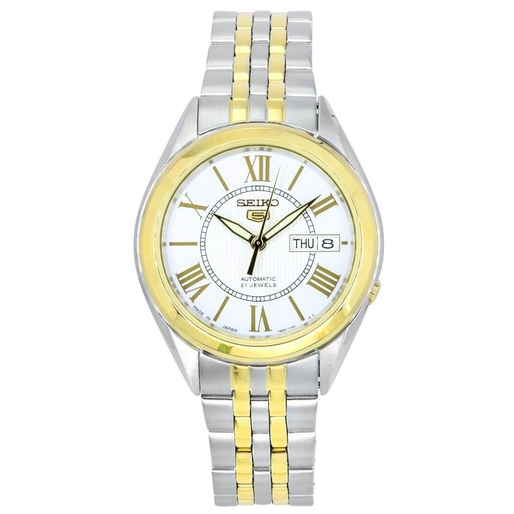 A Seiko two-tone stainless steel watch with a silver dial and gold accents, featuring a date display and analog hands.
