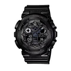 A black CASIO G-SHOCK GA-100CF-1ADR watch with a resin band and a digital display showing time, date, and various watch features.