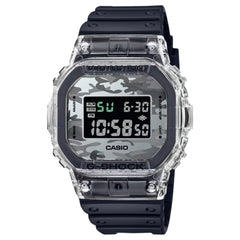 A CASIO G-SHOCK DW-5600SKC-1DR watch with a digital display showing time and date, featuring a camouflage pattern on the band and case.