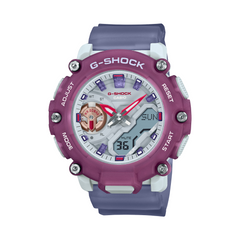 A Casio G-Shock watch with a purple band and white dial, featuring analog and digital display, along with multifunctional buttons and a resin case.