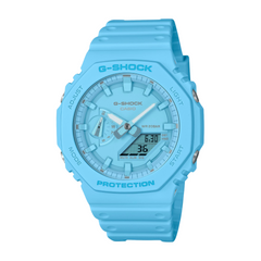 A blue CASIO G-SHOCK watch with an analog dial and a plastic band.