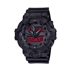 Black Casio G-Shock watch with digital display on a white background