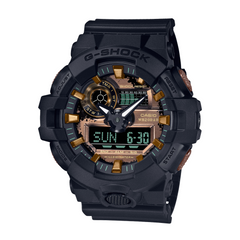 A black CASIO G-SHOCK analog-digital watch with a resin band, featuring a digital display and multiple watch features visible.
