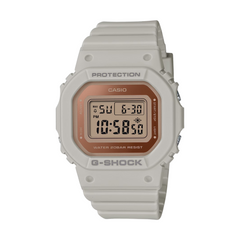 A Casio G-Shock watch with a gray case and a digital display showing time and date, with the G-Shock logo visible.