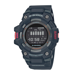 A digital CASIO G-SHOCK watch with a black band and casing, displaying time and various features on its LCD screen.