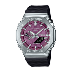 G-Shock watch with silver case and black strap on a white background