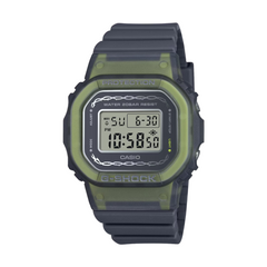 A digital CASIO G-SHOCK watch with a green resin band and black case, displaying time and various watch features on its digital screen.