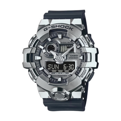 A Casio G-Shock GM-700-1A watch with a digital display, featuring a black band and silver-tone case.