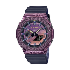 A Casio G-Shock watch with a purple ion-plated bezel, digital display, and a black resin band.