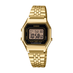 Gold Casio digital watch on a white background