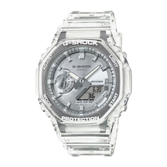 A CASIO G-SHOCK watch with a clear resin band and case, featuring a digital display and analog hands.