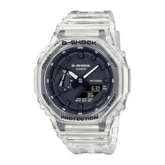 A CASIO G-SHOCK watch with a clear resin band and case, featuring a black analog dial with digital readouts and buttons for various watch functions.