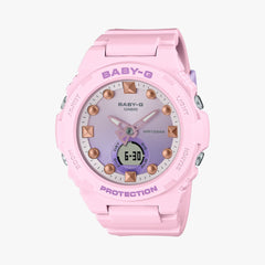 A pink CASIO G-SHOCK BGA-320-4A analog-digital watch with a resin band and case, featuring a white dial, pink casing, and digital display.