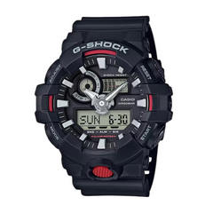 A black CASIO G-SHOCK analog-digital watch with a digital display showing the time, date, and various watch features.