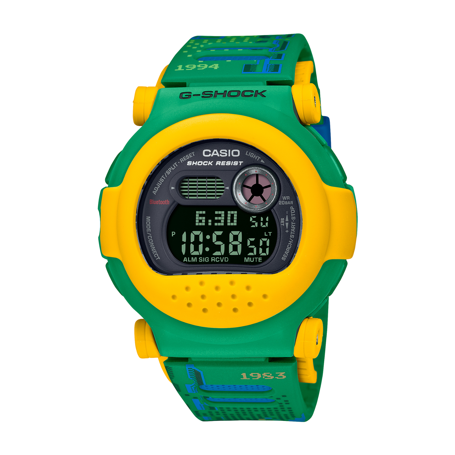 A CASIO G-SHOCK watch with a green band, yellow casing, and digital display showing time and date.