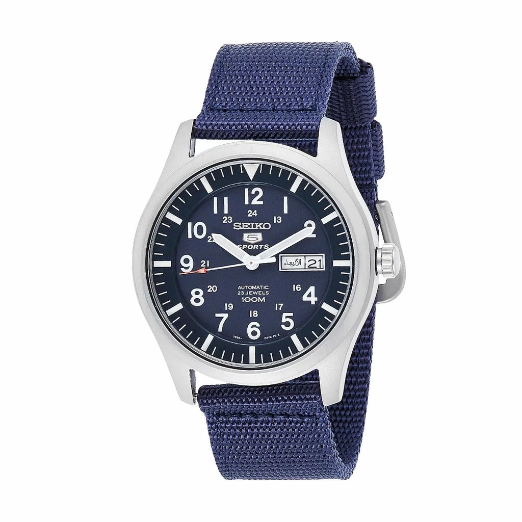 A Seiko watch with a blue nylon band and blue dial, featuring a stainless steel case and day/date function.